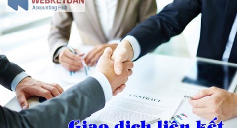 Image of business partners handshaking over business objects on