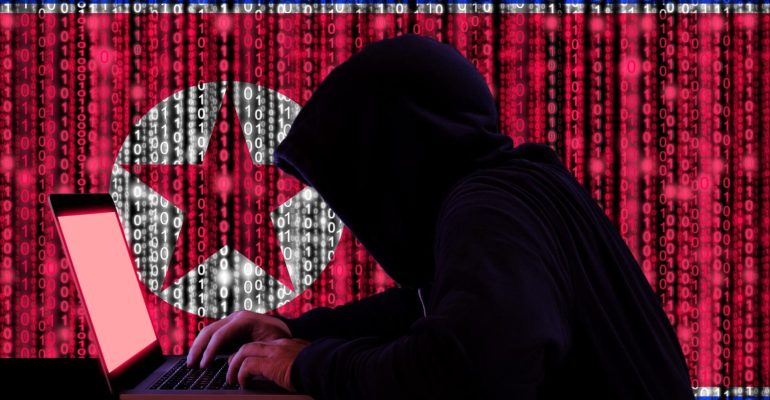 Hacker-with-computer-on-background-with-north-korea-flag-1536x1024